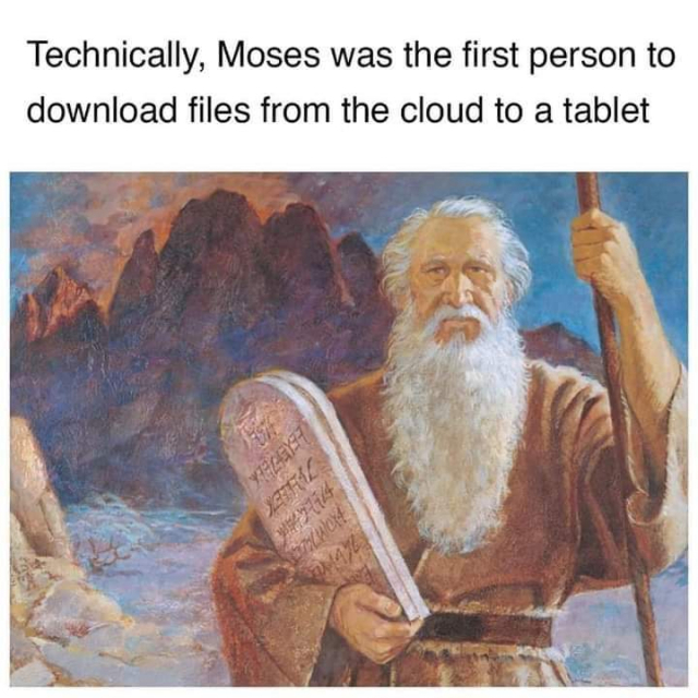 Moses holding stone tablet after coming down from the mountain 